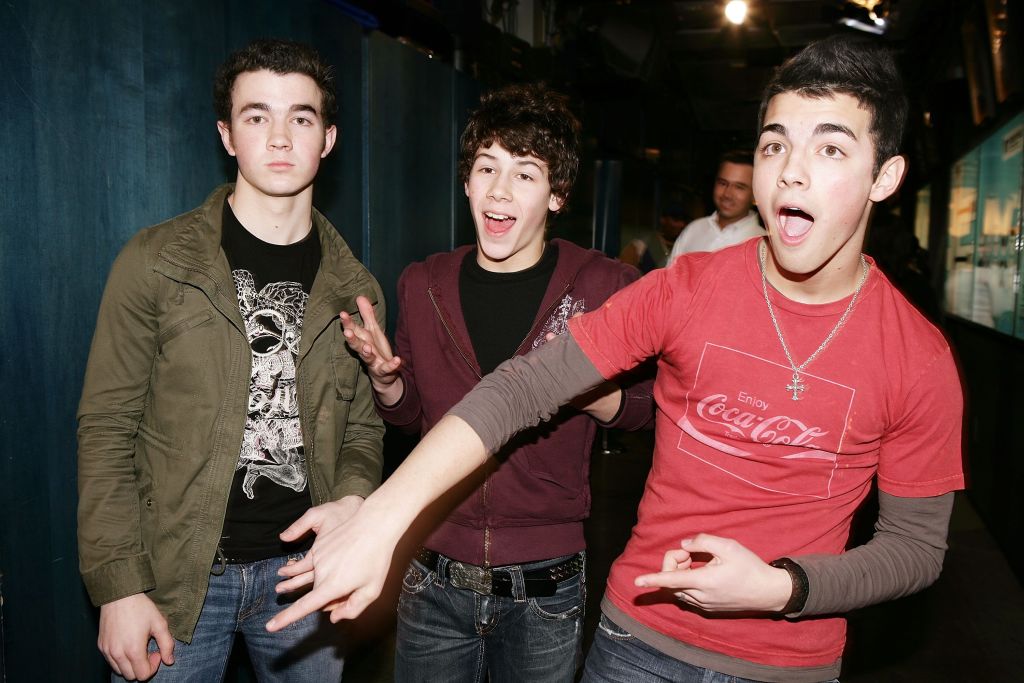 Kevin, Nicholas, and Joe Jonas of The Jonas Brothers pose for a photo