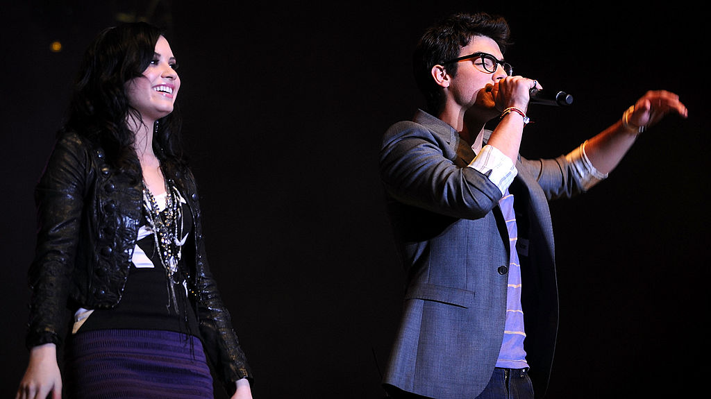 Singer Demi Lovato and Joe Jonas perform at the Family Volunteers Event