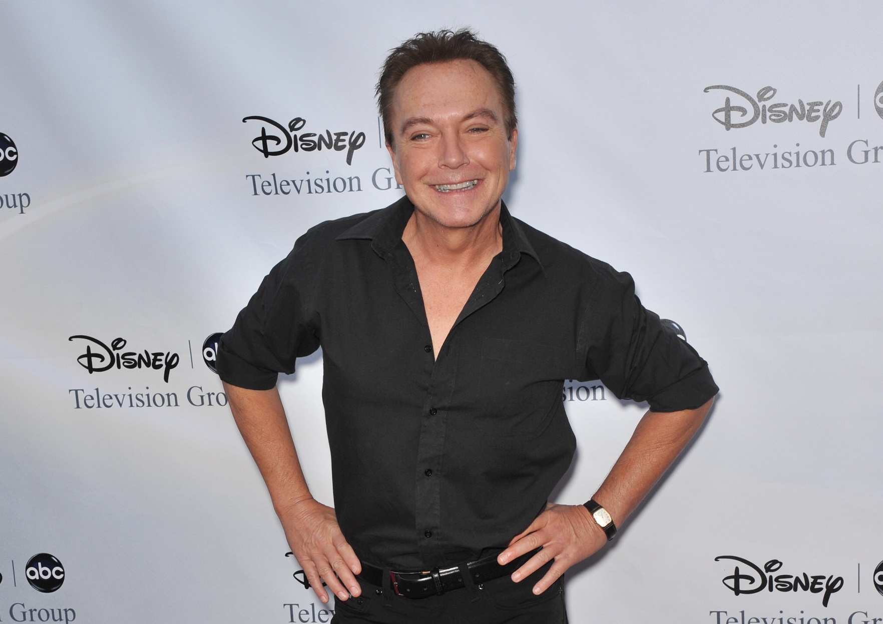 David Cassidy wearing black shirt is looking at camera and smiling - 2009