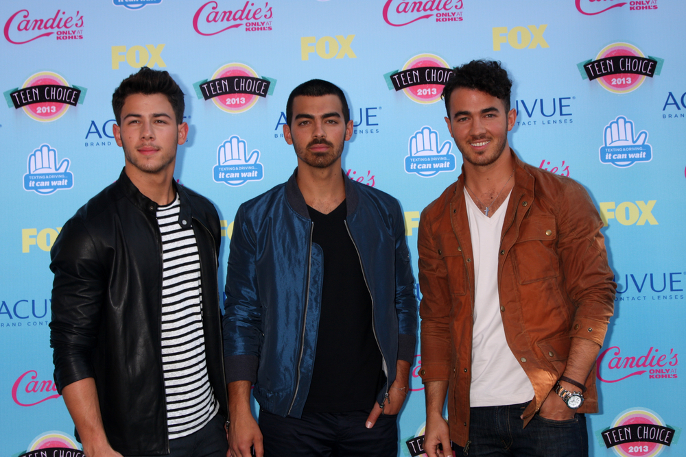 Nick Jonas, Joe Jonas, Kevin Jonas at the 2013 Teen Choice Awards at the Gibson Ampitheater Universal on August 11, 2013