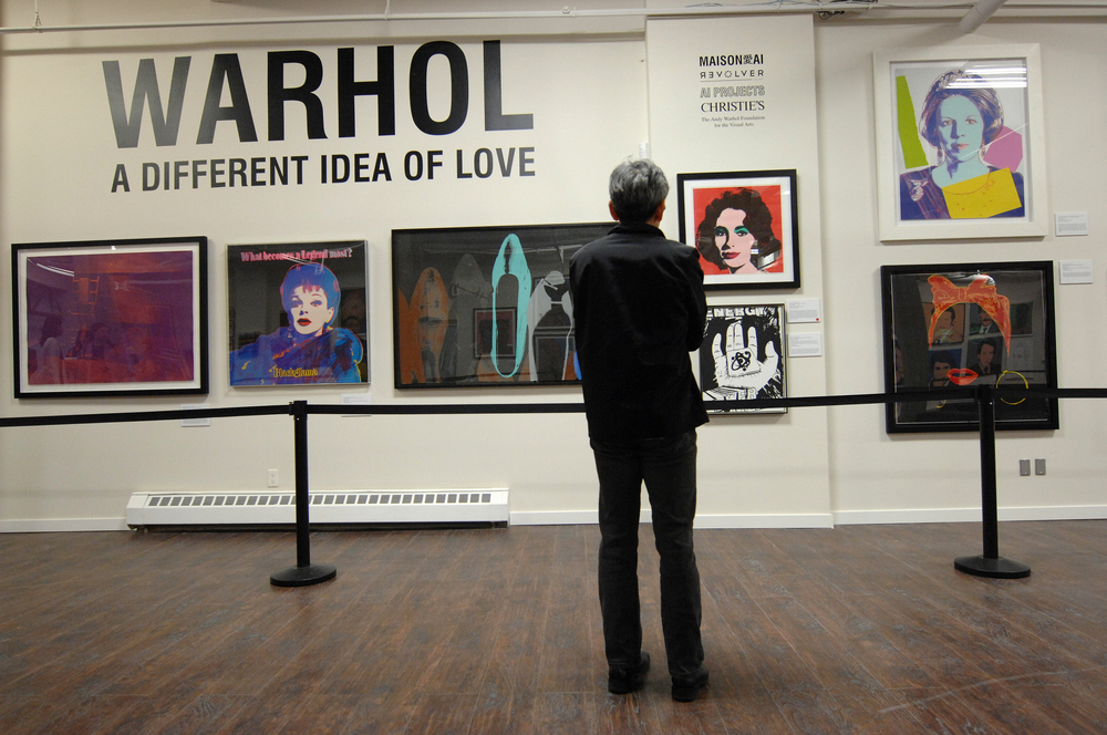 exhibition of works  of pop artist Andy Warhol displayed on the wall in Yaletown warehouse in Vancouver