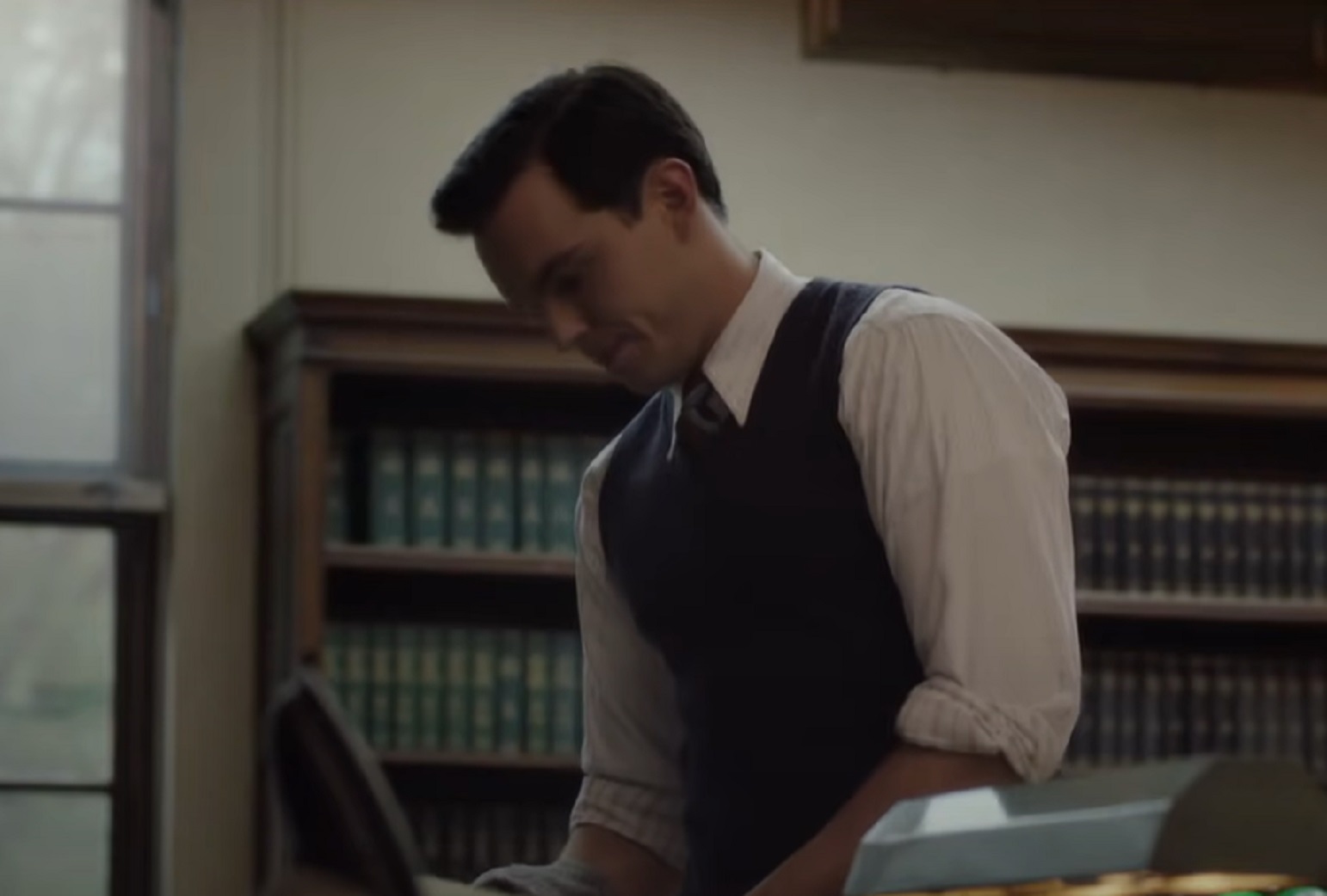 Screenshot: J.D. Salinger wearing white shirt is looking down - from Rebel in the Rye (2017)