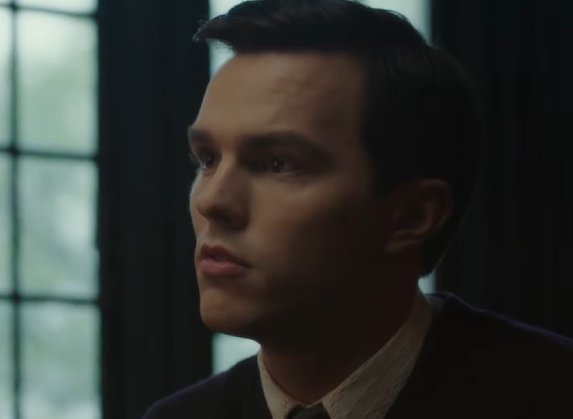 Screenshot: J.D. Salinger wearing dark suit is looking at front - from Rebel in the Rye (2017)