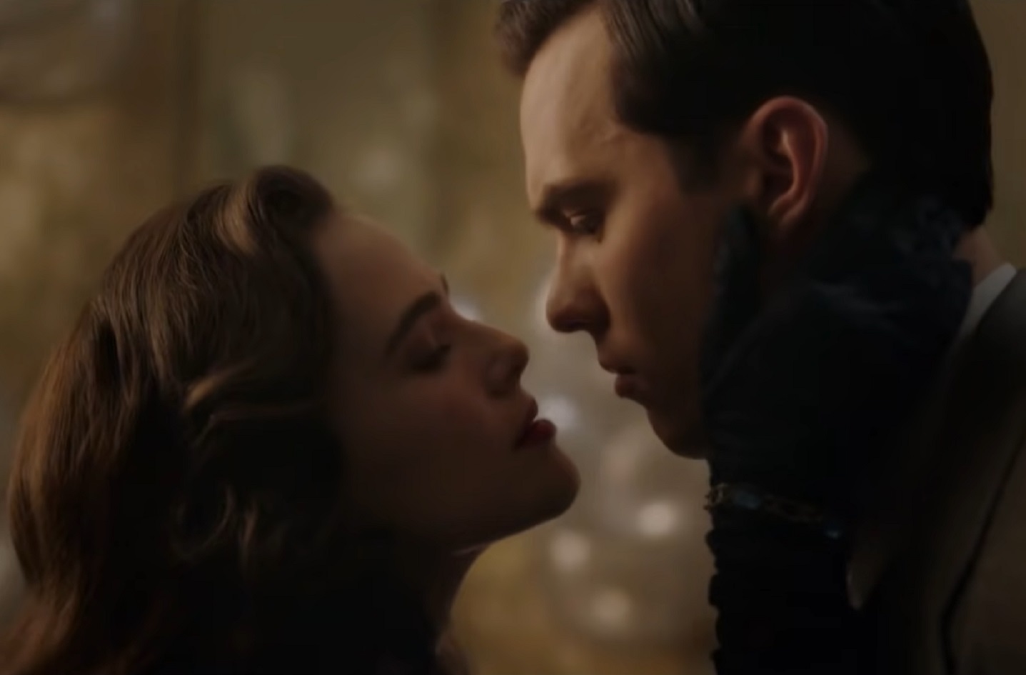 Screenshot: J.D. Salinger wearing dark suit is looking at woman - from Rebel in the Rye (2017)