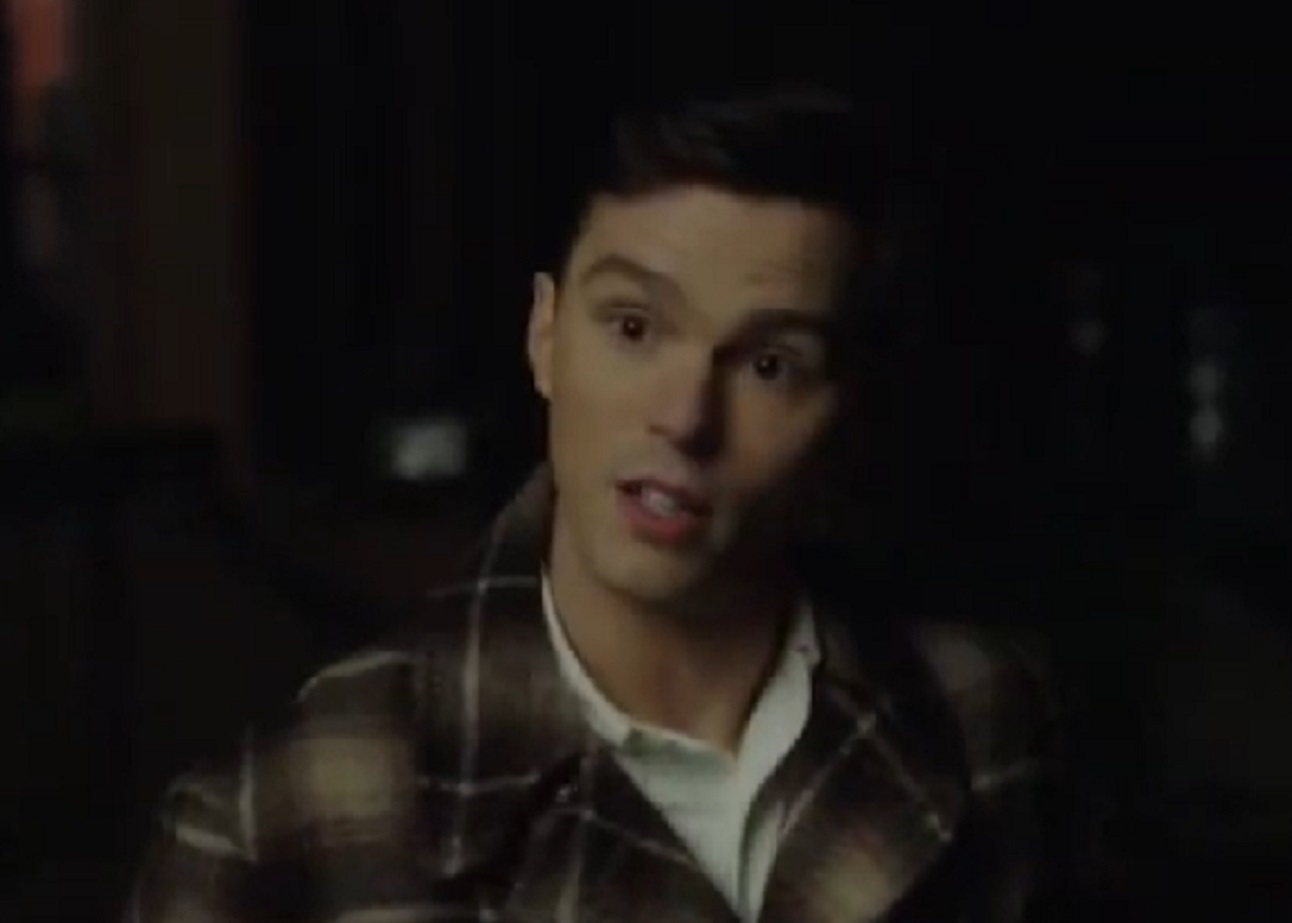 Screenshot: J.D. Salinger wearing shirt is standing outside at night- from Rebel in the Rye (2017)