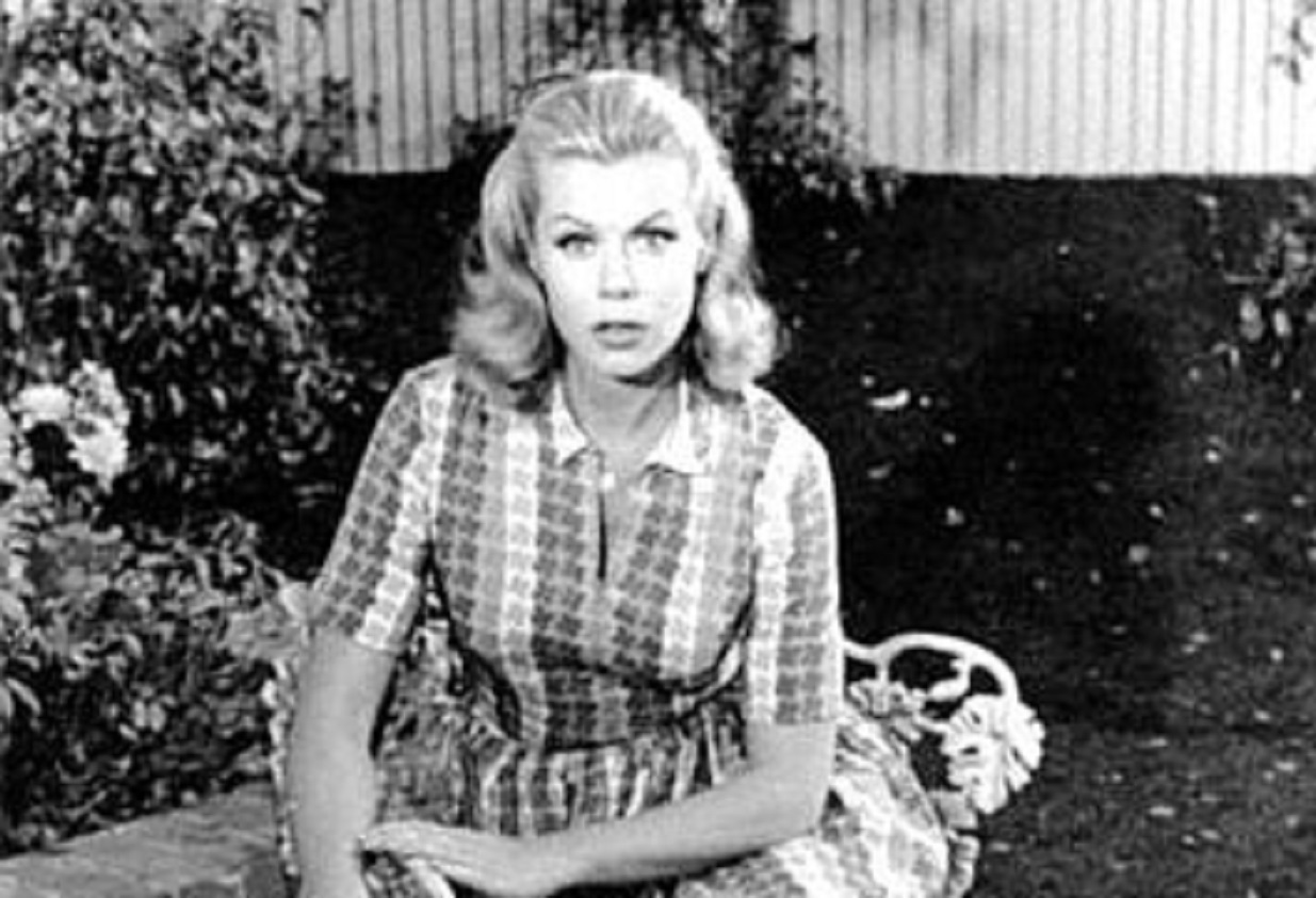B&W portrait of Elizabeth Montgomery looking at camera.