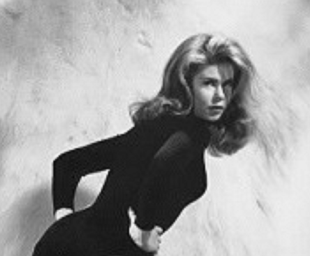 B&W portrait of Elizabeth Montgomery looking at camera.