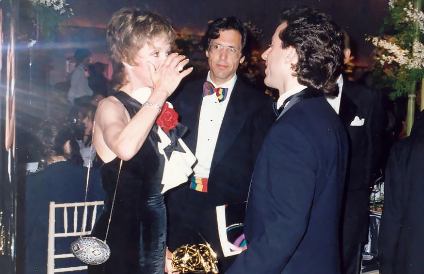 Mary Tyler Moore talks with Jerry Seinfeld, as Mary's husband looks on