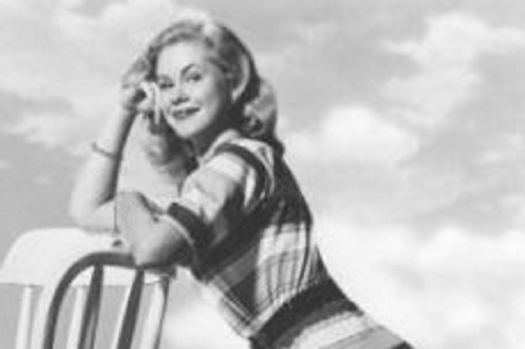 B&W portait of Elizabeth Montgomery looking at camera.