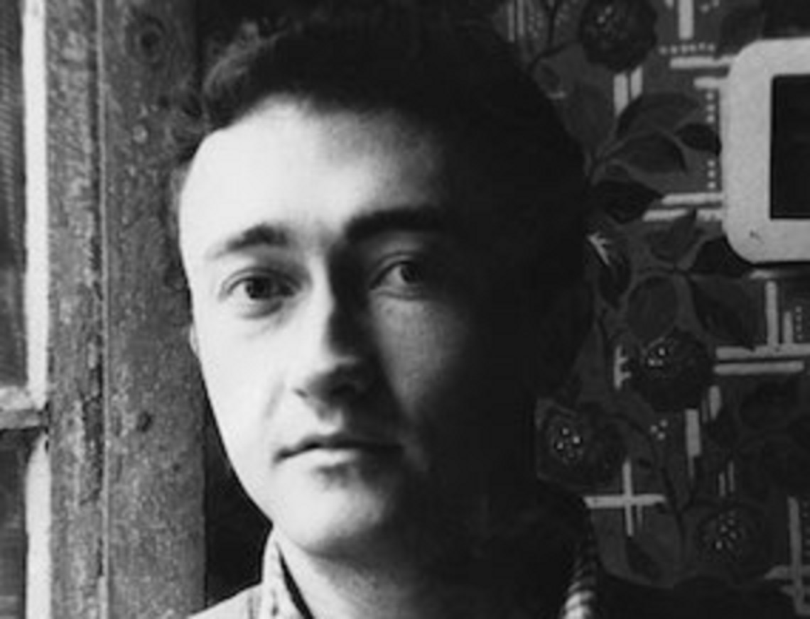 B&W portrait of Curtis Harrington looking at camera.