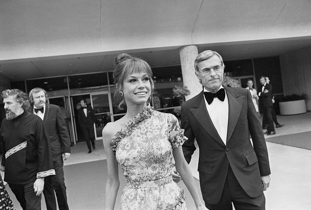 Portrait of Mary Tyler Moore and Grant Tinker in formal clothes