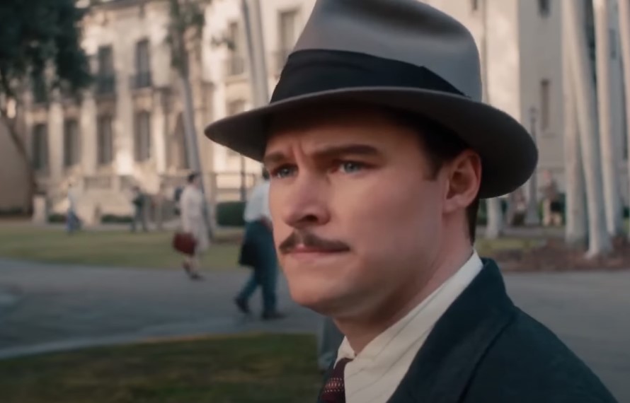 Jack Reynor as Jack Parsons in  Strange Angel  in suit