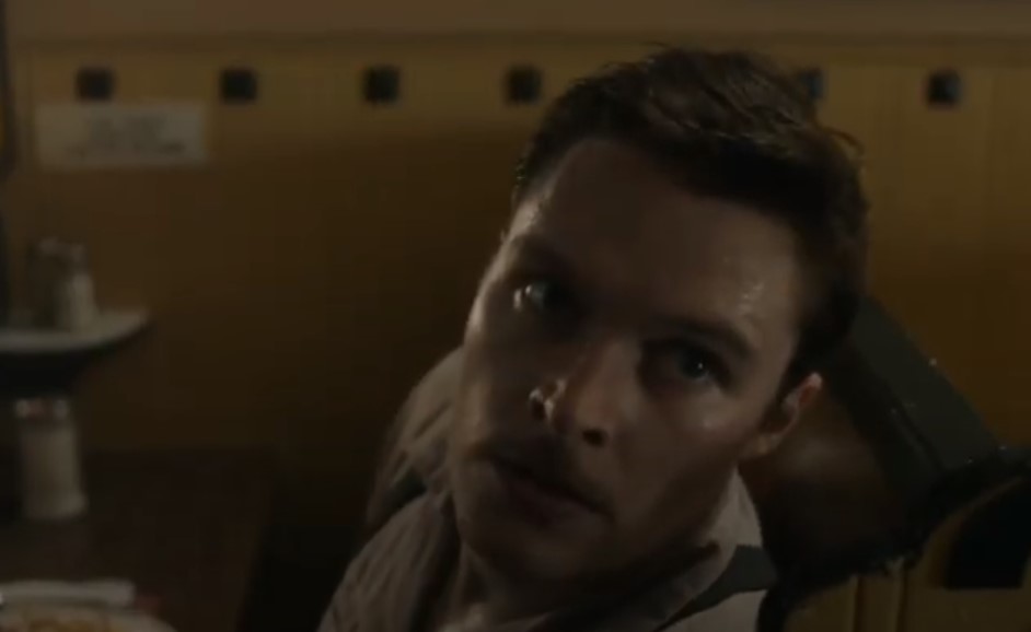 Jack Reynor as Jack Parsons sitting