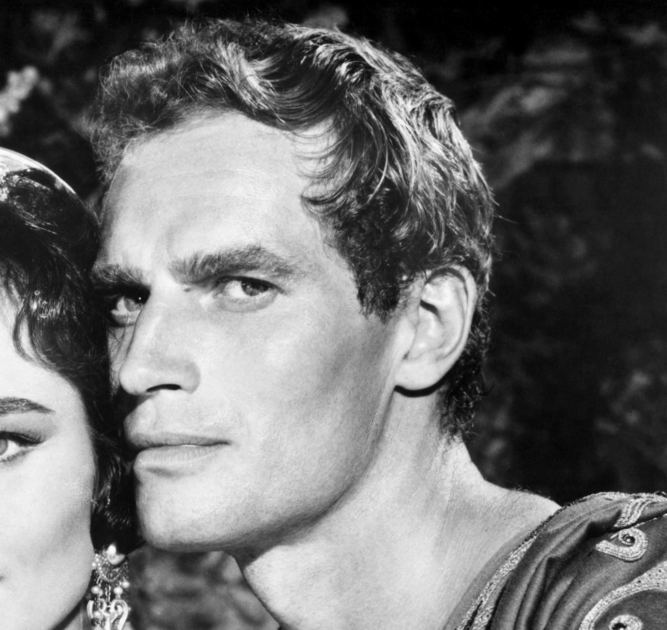 Grayscale Portrait Photo Of The Actor Charlton Heston and Actress Marina Berti