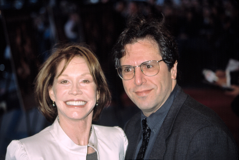 Mary Tyler Moore and husband  looking at camera