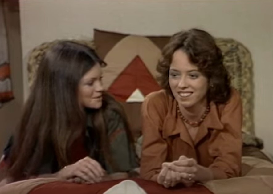 Mackenzie Phillips in One Day at a Time   sitting on a couch