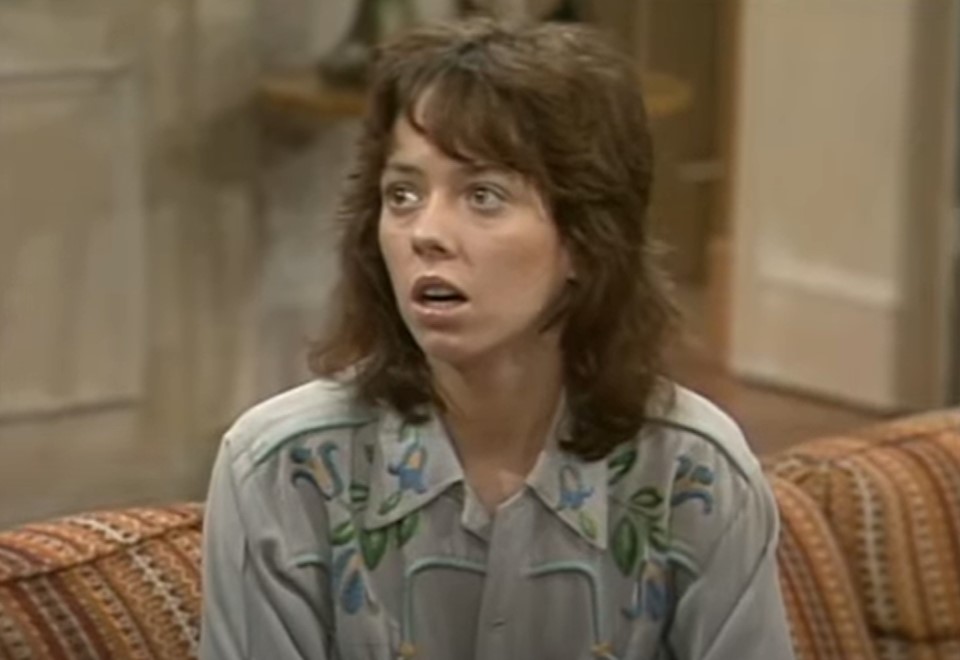 Mackenzie Phillips in One Day at a Time   sitting on a couch