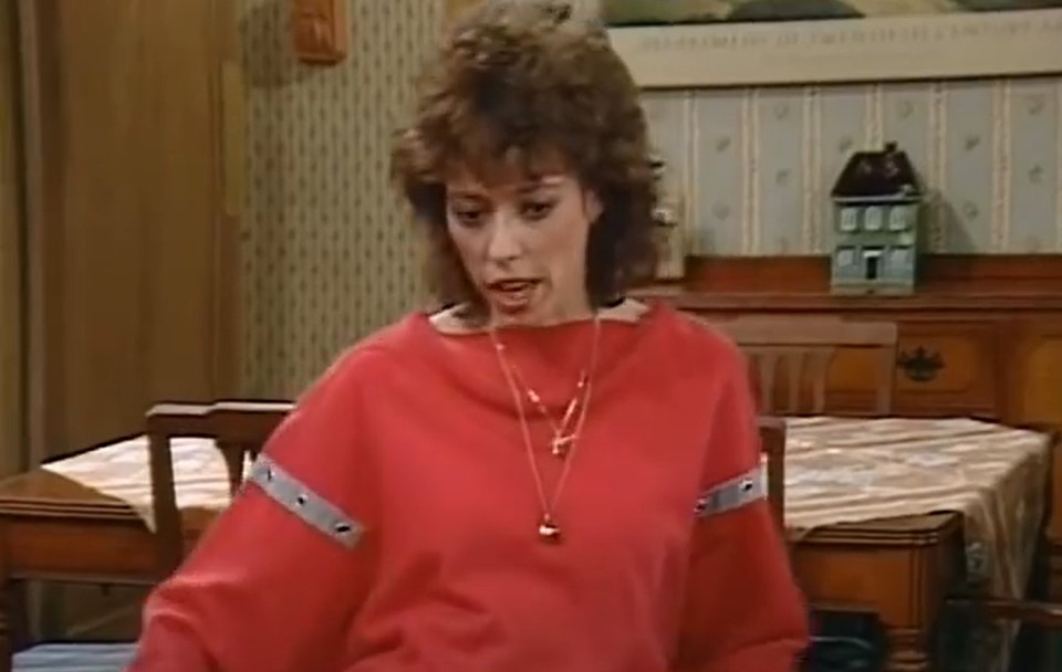 Mackenzie Phillips in One Day at a Time   sitting on a couch