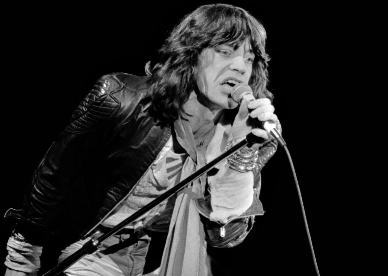 Mick Jagger performing