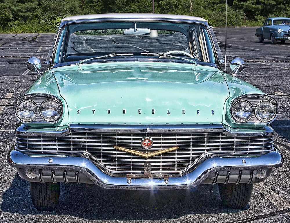 Profile Photo of light green Studebaker 1 at a parking lot