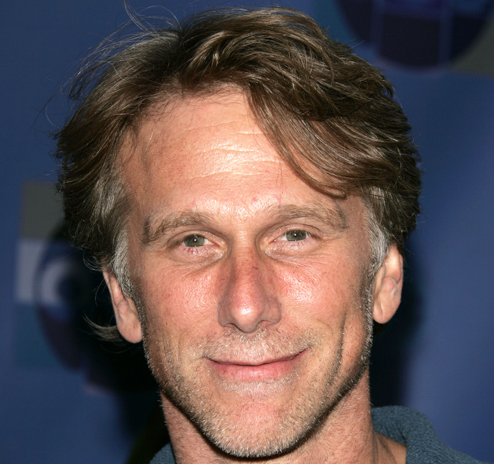 Portrait Photo of the director Peter Horton at the ABC Summer Press Tour Party, wearing a blue shirt, smiling