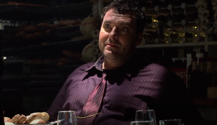 Tom Sizemore  in Enemy of the State in purple  shirt