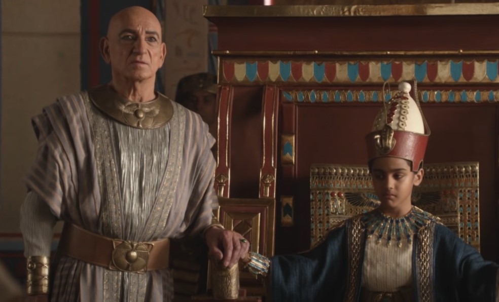 king tut as a child in the movie sitting on throne