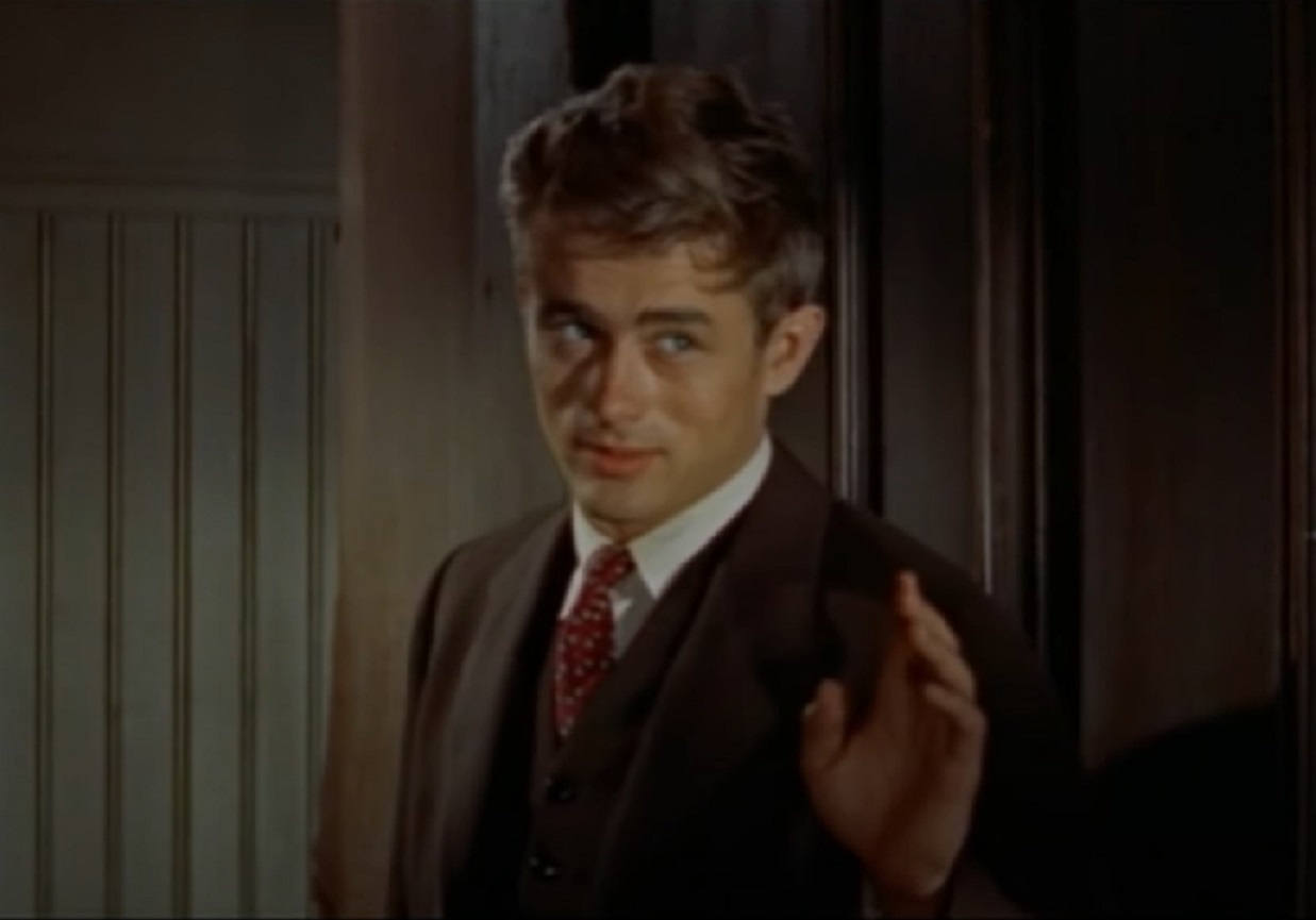 Screenshot: photo of James Dean wearing suit is looking at front - from the East Of Eden (1955).
