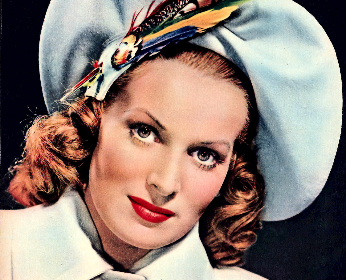 Photo of Maureen O’Hara from ‘’Modern Screen’’ magazine. Wearing white coat and a glamorous hat