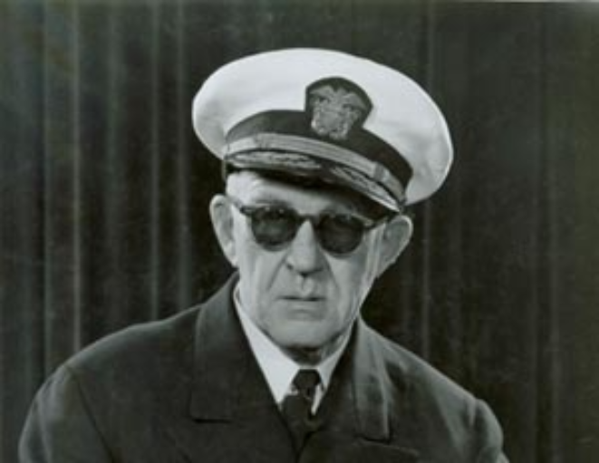 Grayscale Portrait Photo of the director John in admiral's uniform