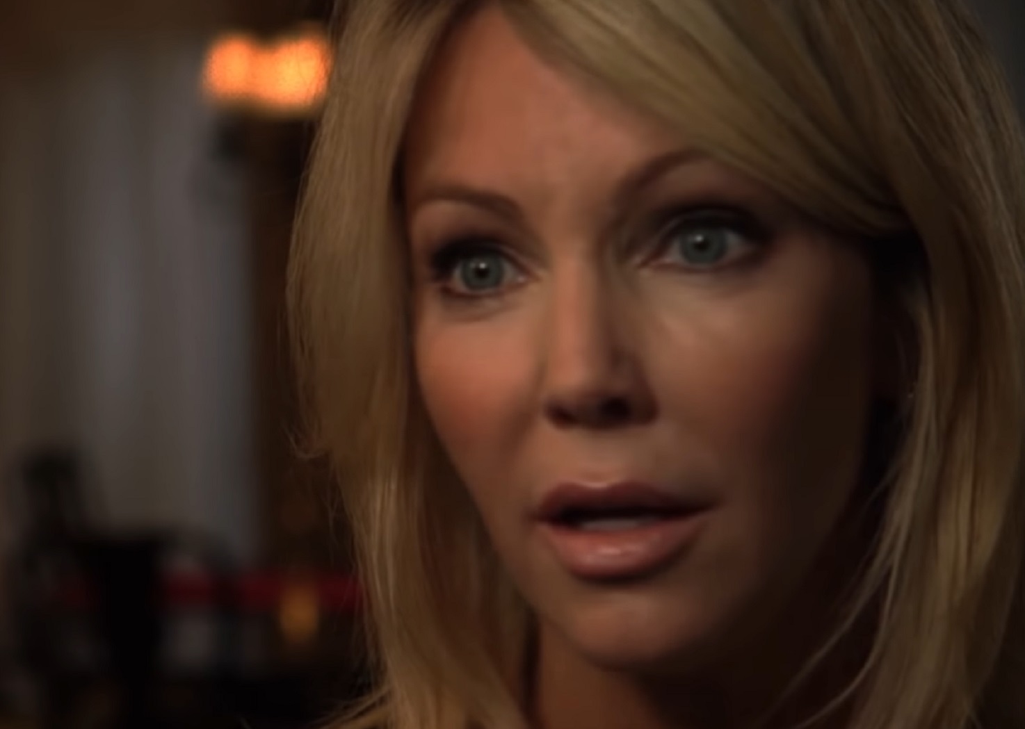 Screenshot of Heather Locklear looking surprised - from Flying By (2009)