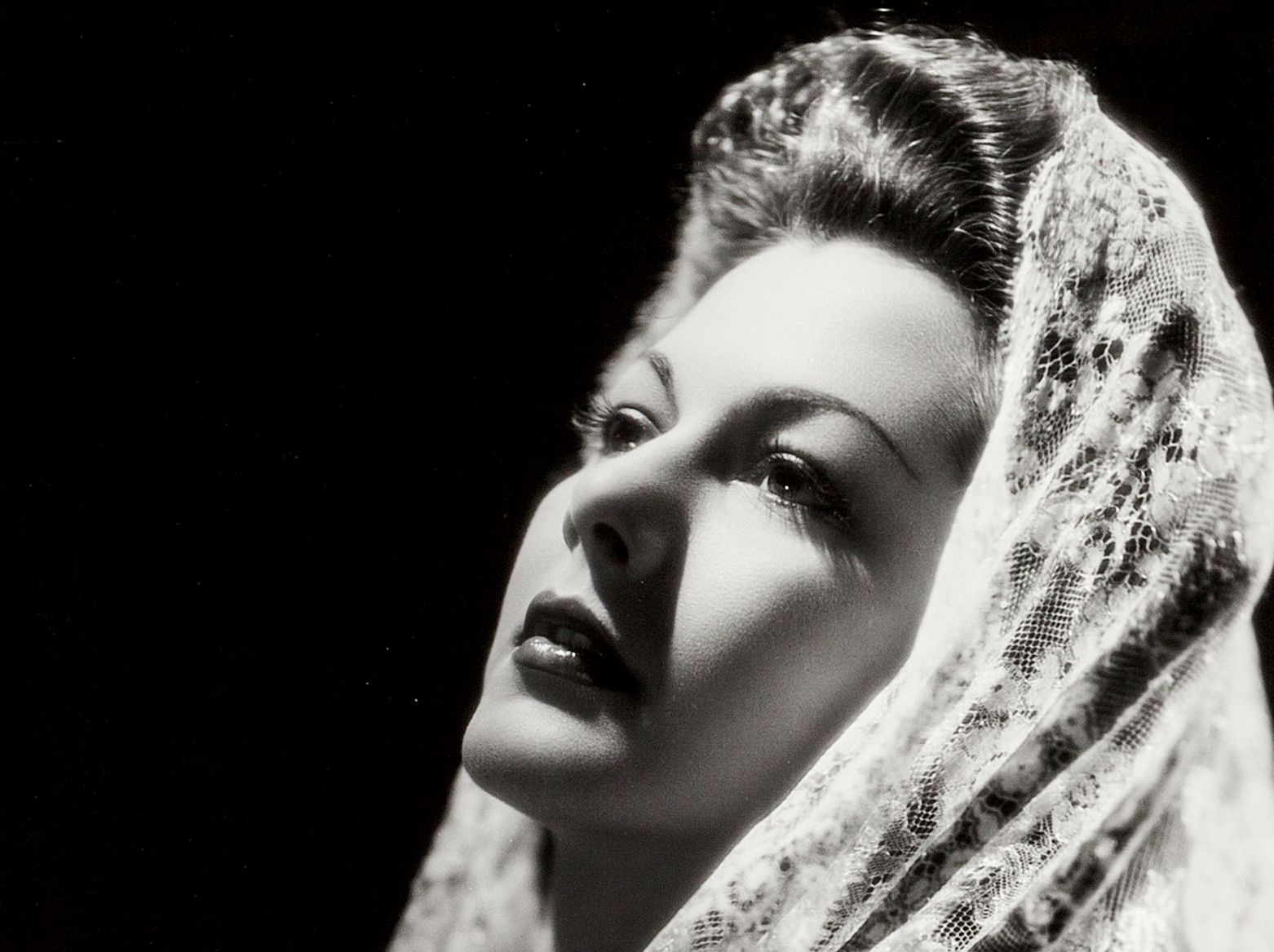 Maria Montez covered with white scarf