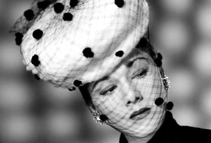 Maria Montez in hat, scarf