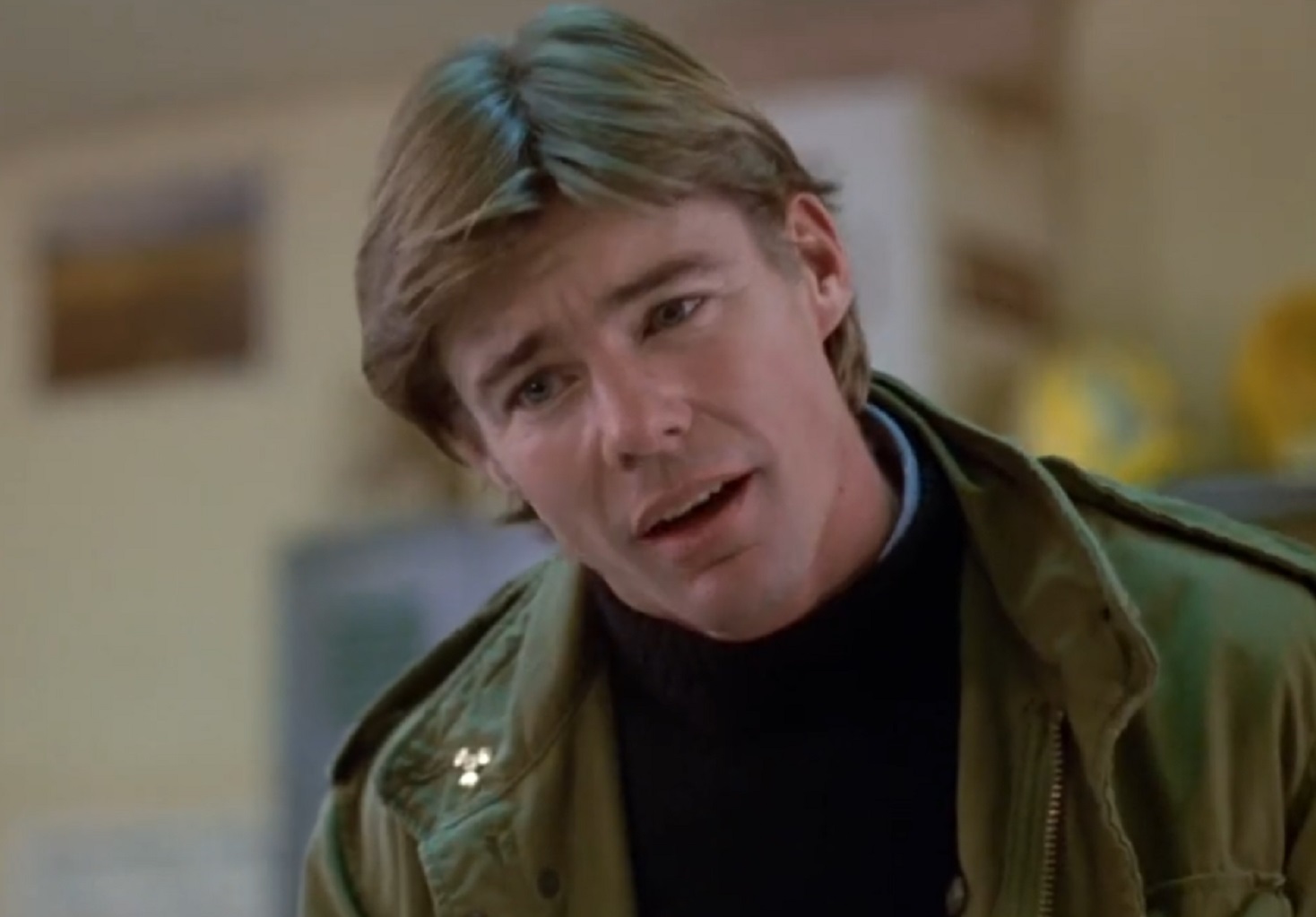 Screenshot: Jan-Michael Vincent wearing green jacket is looking at front - from  Defiance (1980)