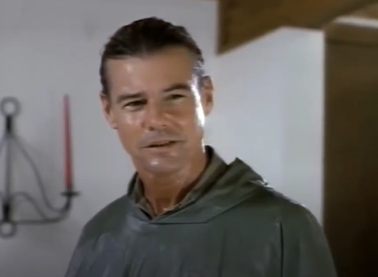 Screenshot: Jan-Michael Vincent wearing grey hoodie is smiling at camera - from Hidden Obsession (1993)