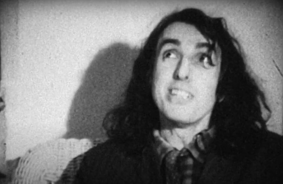 Tiny Tim singing