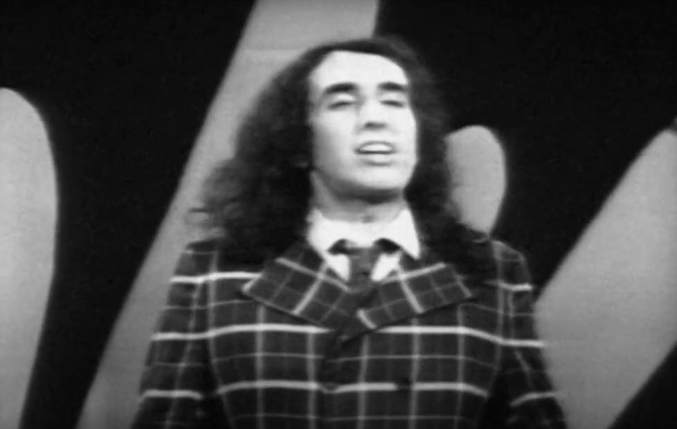 Tiny Tim singing