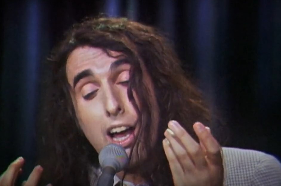 Tiny Tim singing