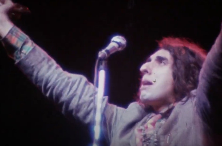Tiny Tim performing on stage