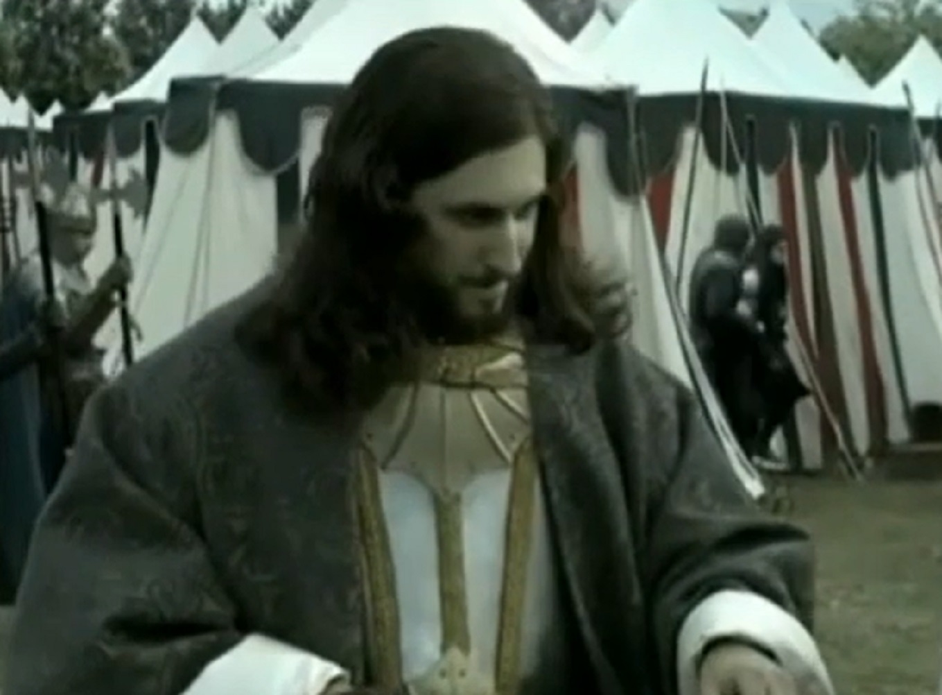 Screenshot of Charles VIII of France with long hair looking down outside - from Isabel (2011-2014)