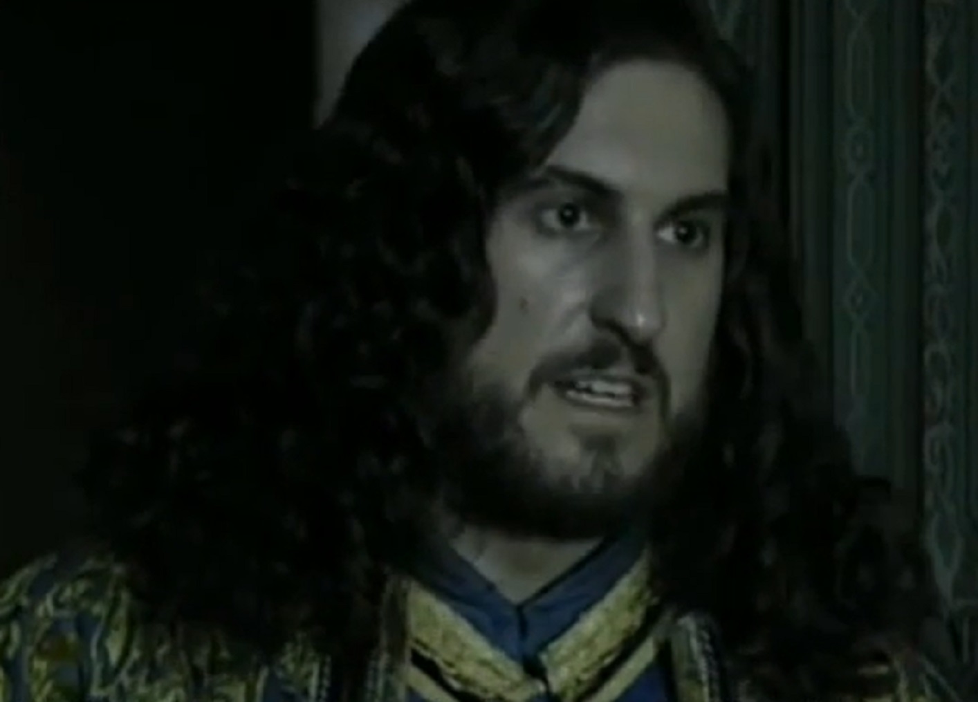 Screenshot of Charles VIII of France with long hair looking upset- from Isabel (2011-2014)