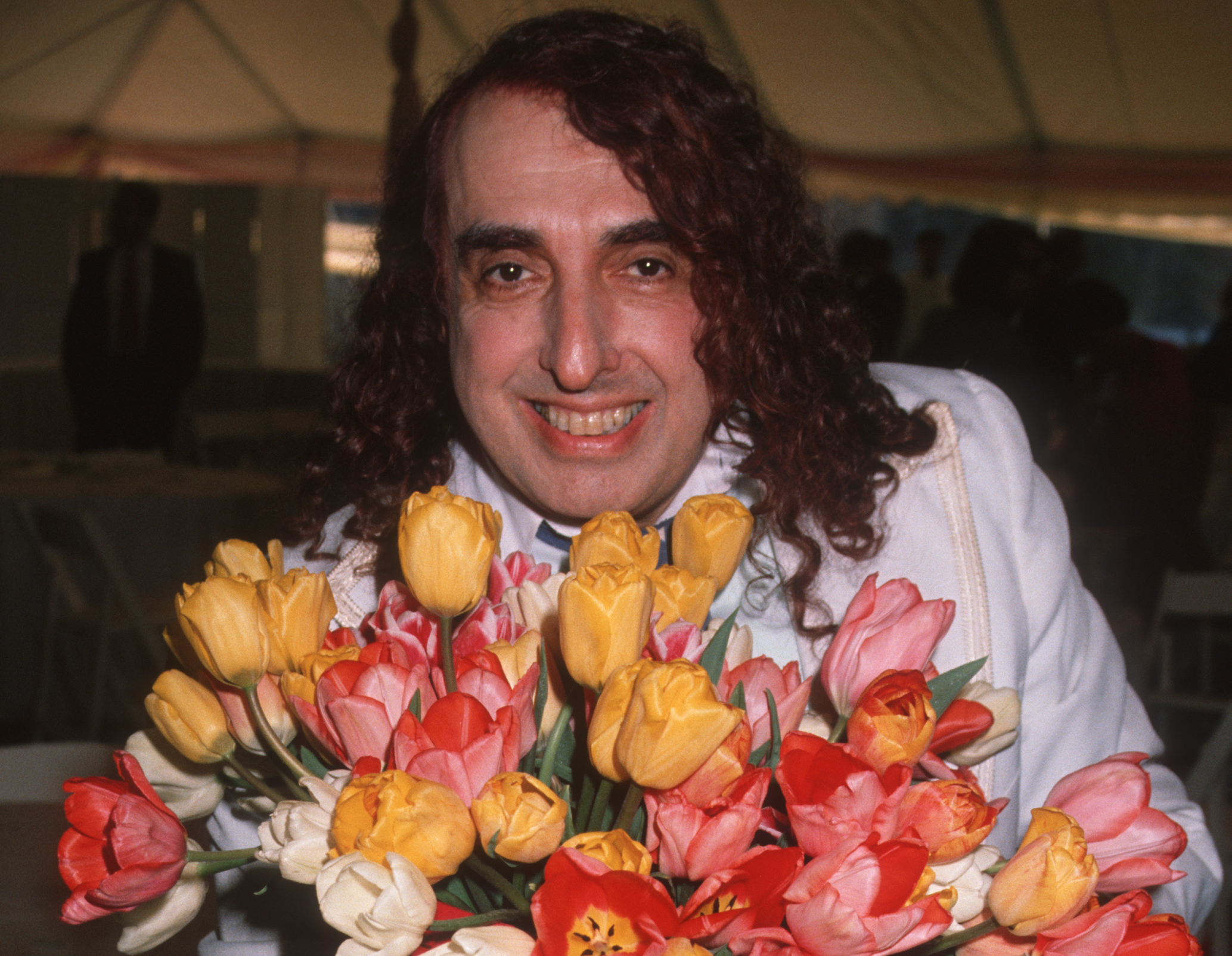 Tiny Tim (with tulips) during 