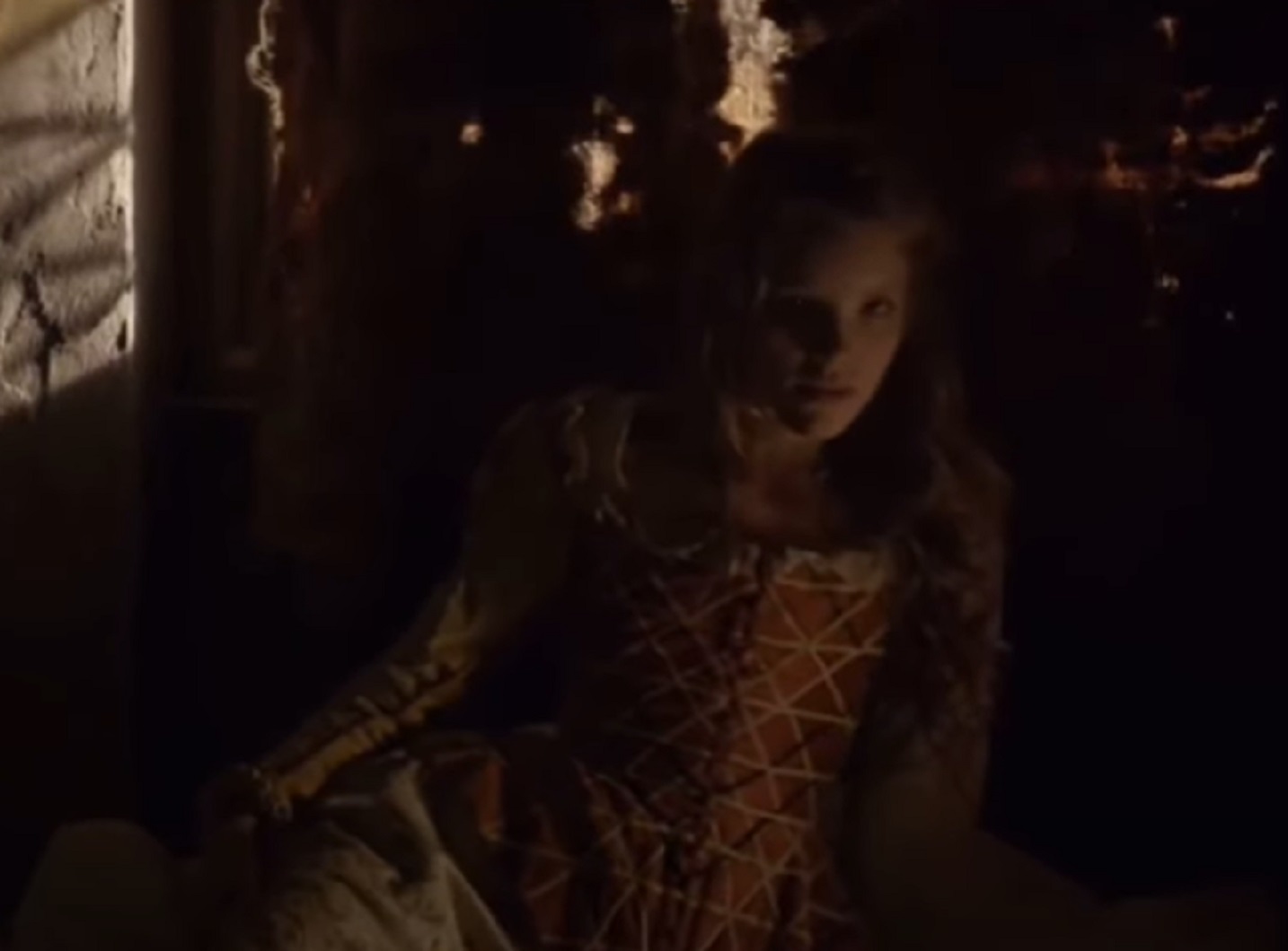 Screenshot of Catherine Howard with long hair looking at front - from The Tudors (2007–2010)
