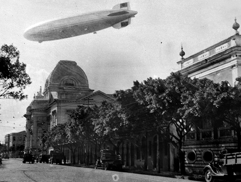 The Hindenburg Zeppelin flying over San Antonio district of the city of Recife, capital of Pernambuco, Brazil