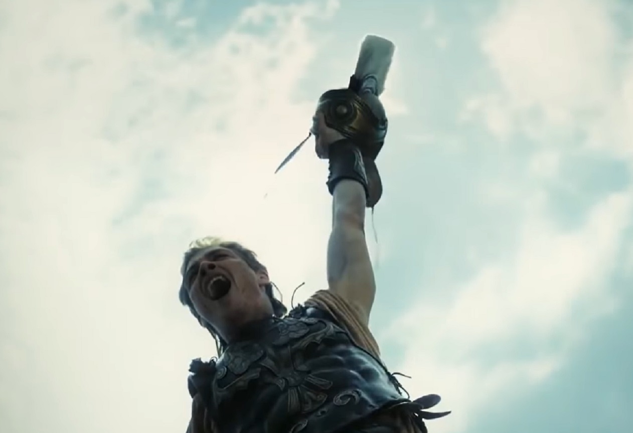 Screenshot of Alexander The Great celebrating outside wearing armor  - from Alexander the Great (2014)