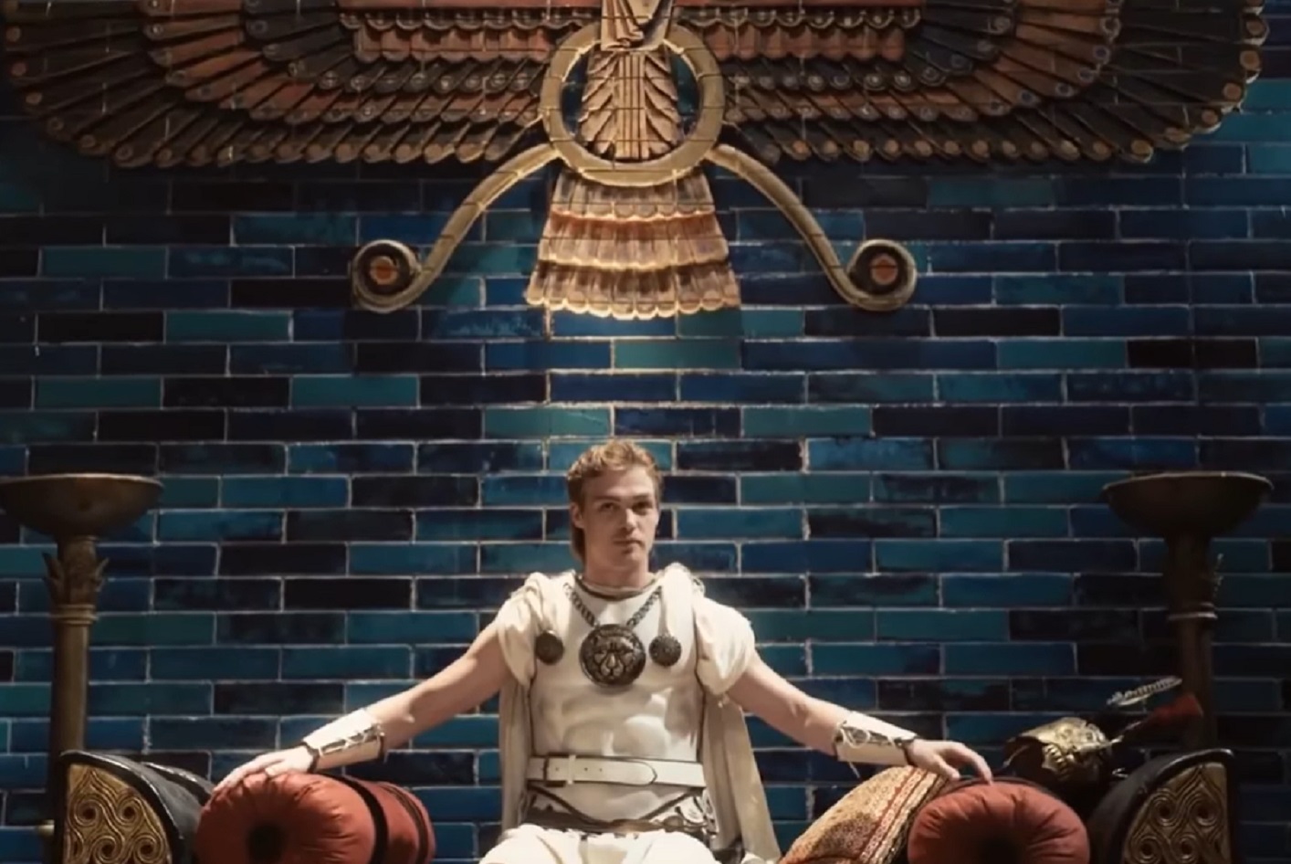 Screenshot of Alexander The Great seating and looking happy - from Alexander the Great (2014)