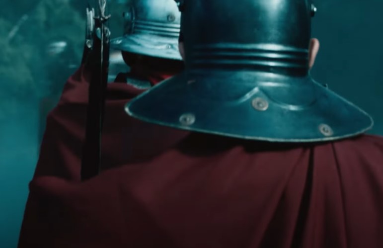 Roman soldiers in uniforms going to battle