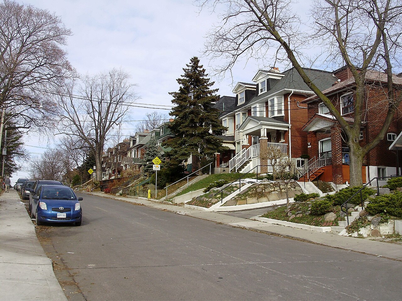 Houses line Alberta Avenue in the Wychwood neighbourhood of Toronto, Ontario, Canada. - 2008