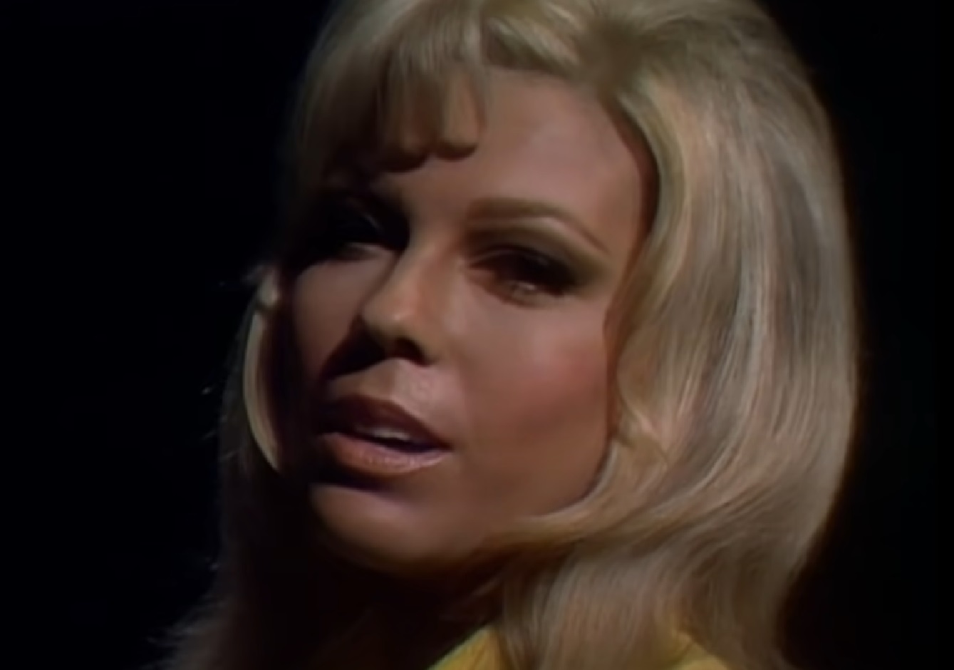 Screenshot of Nancy Sinatra looking and smiling at camera - from The Ed Sullivan Show (1948-71)