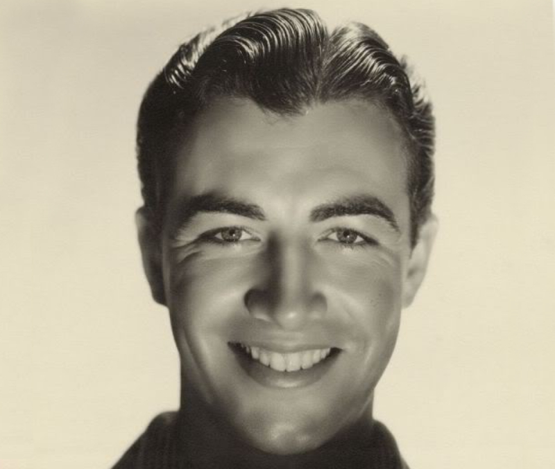 Robert Taylor in black shirt